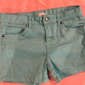 I am selling falls creek shorts. They are a blue color. They are size xL (14/16)